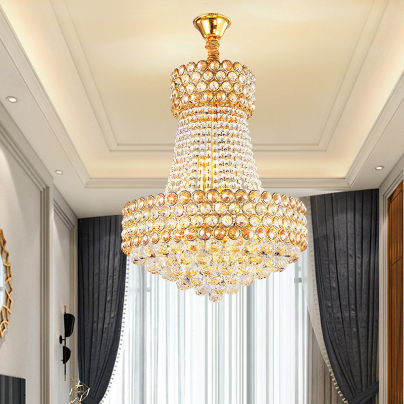 Lustre moderne en or avec abat-jour en cristal de verre biseauté - Focus sur le salon à 5/8 lumières