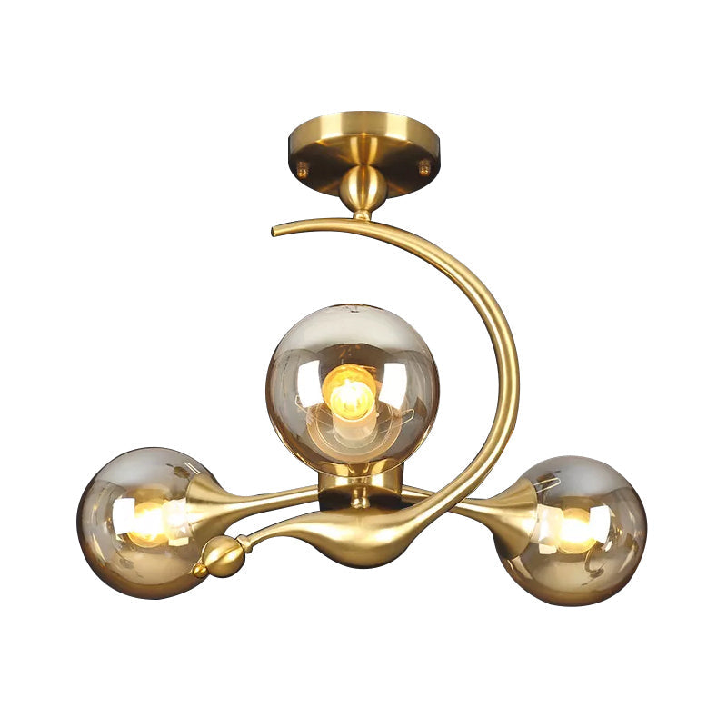 Lustre semi-encastré en forme de boule en verre ambré éclaté - Plafonnier postmoderne à 3/5 têtes en laiton avec bras incurvé