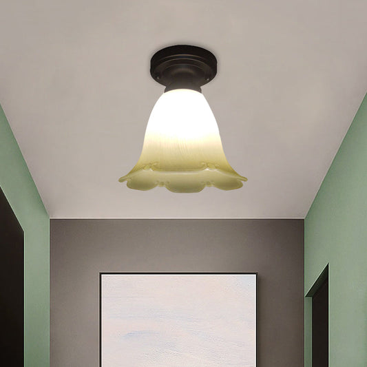 White Glass Flush Mount Ceiling Light with Black Base and Cottage Flower Design