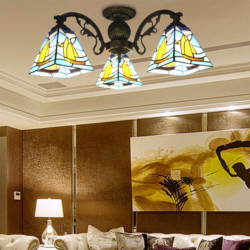 Lustre géométrique coloré Lodge : suspension en vitrail inversé jaune et bleu pour salon