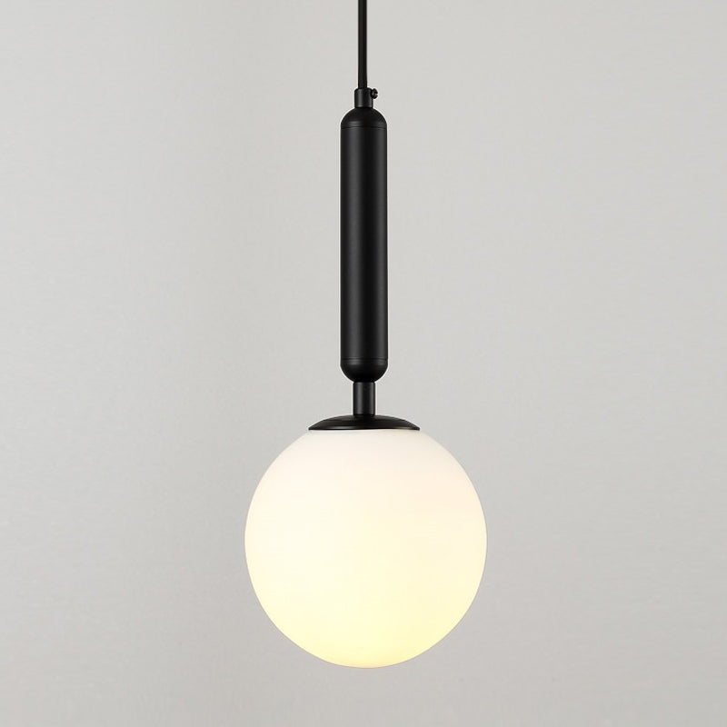 Suspension boule postmoderne noire/dorée avec verre transparent/blanc - Éclairage de chambre à coucher