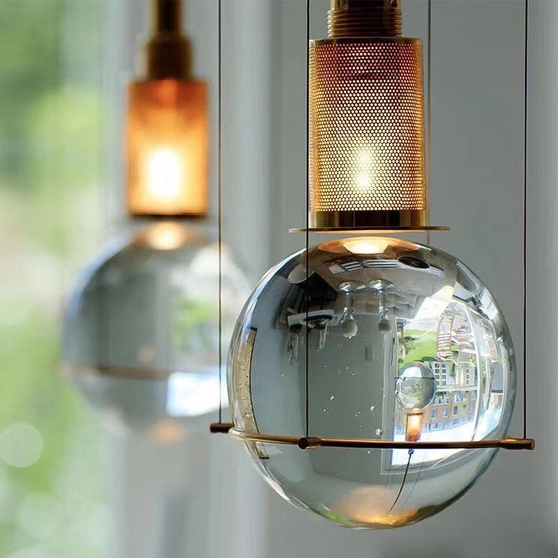 Postmodern Clear Glass Ball Pendant Ceiling Light with Gold Mesh Top - Single Hanging Lamp Kit