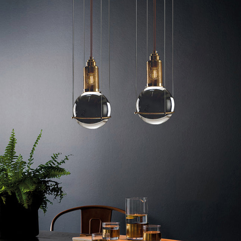 Postmodern Clear Glass Ball Pendant Ceiling Light with Gold Mesh Top - Single Hanging Lamp Kit