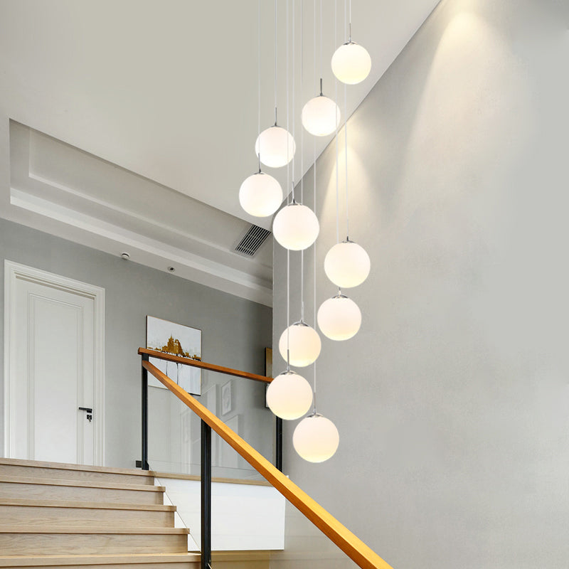 Modernist Glass Multi Light Pendant for Living Room with Orb Cream Shade and White Suspension