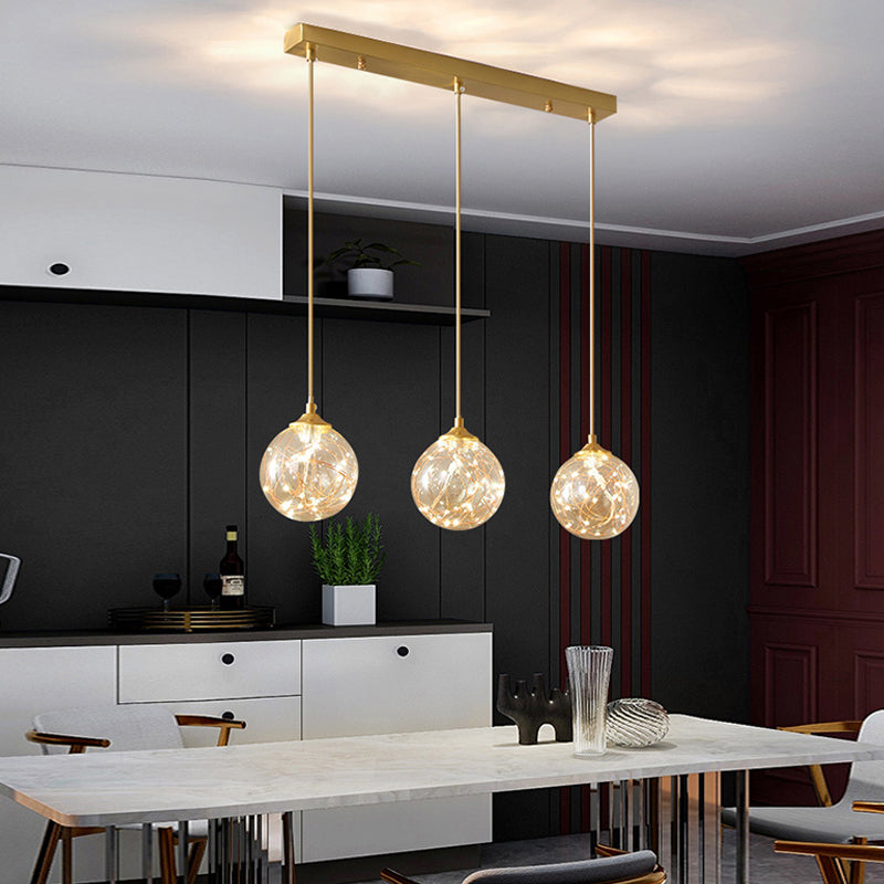 Brass Glass LED Pendant: Modern Sphere Ceiling Lamp for Dining Room