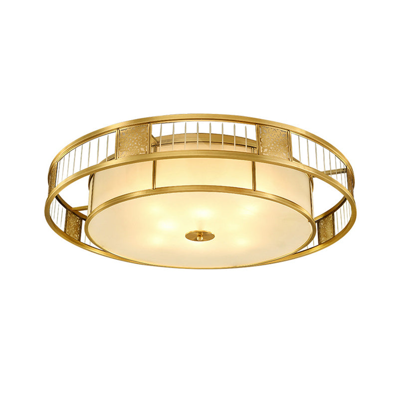 Classic Cream Glass Drum Flush Mount Light With Gold Finish And Cutout Metal Decor - Ideal For