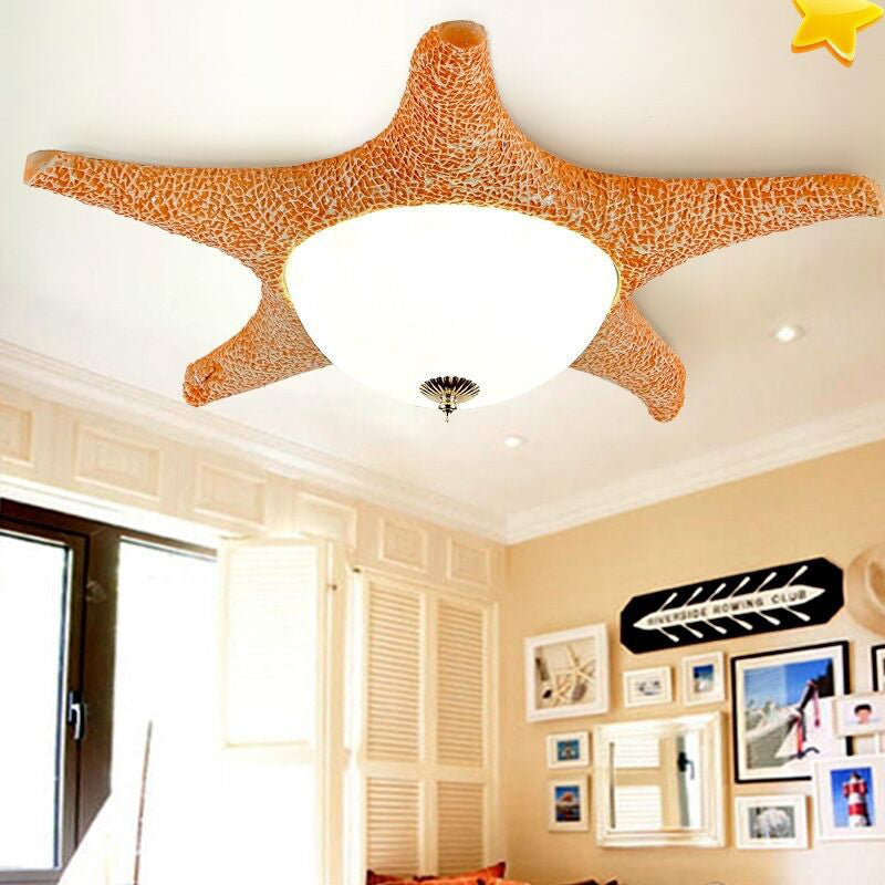 Starfish Kindergarten LED Flush Mount: Resin Ceiling Lighting with Blue Dome Glass Shade