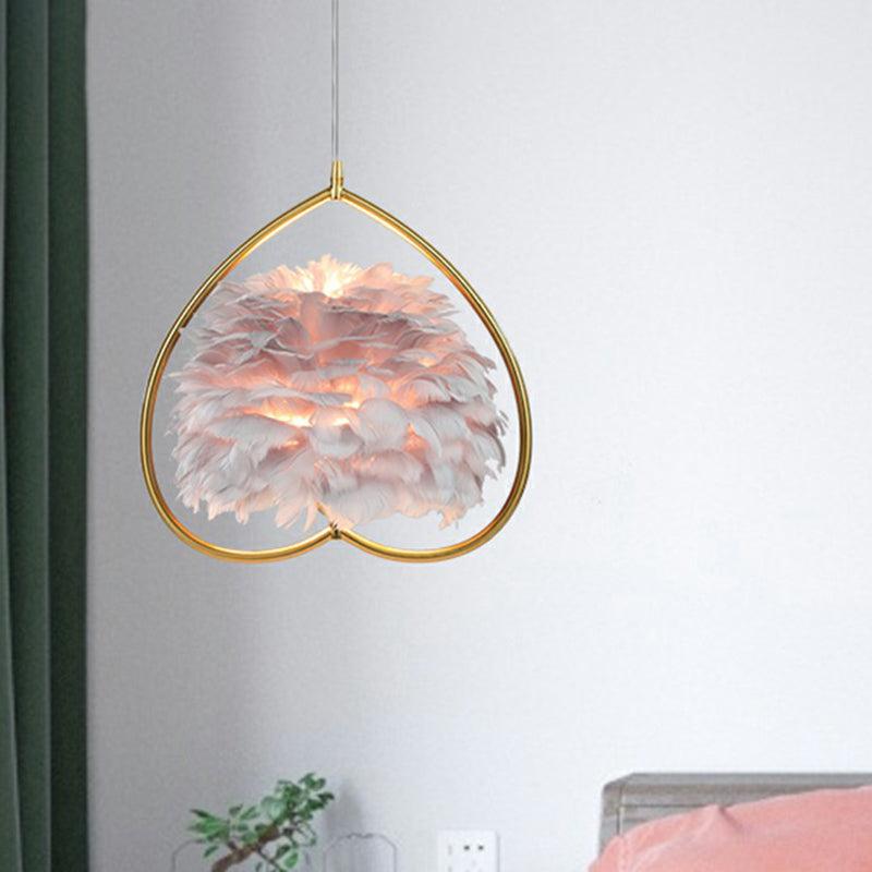 Contemporary Gold Pendant Ceiling Light with Metallic Heart Suspension and Feather Decoration