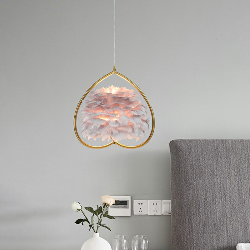Contemporary Gold Pendant Light With Metallic Heart Suspension And Decorative Feather
