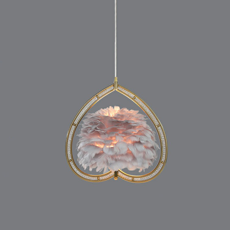 Contemporary Gold Pendant Ceiling Light with Metallic Heart Suspension and Feather Decoration