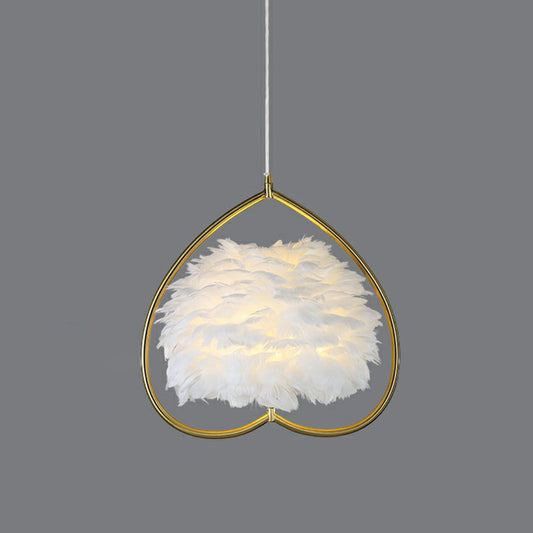 Contemporary Gold Pendant Ceiling Light with Metallic Heart Suspension and Feather Decoration