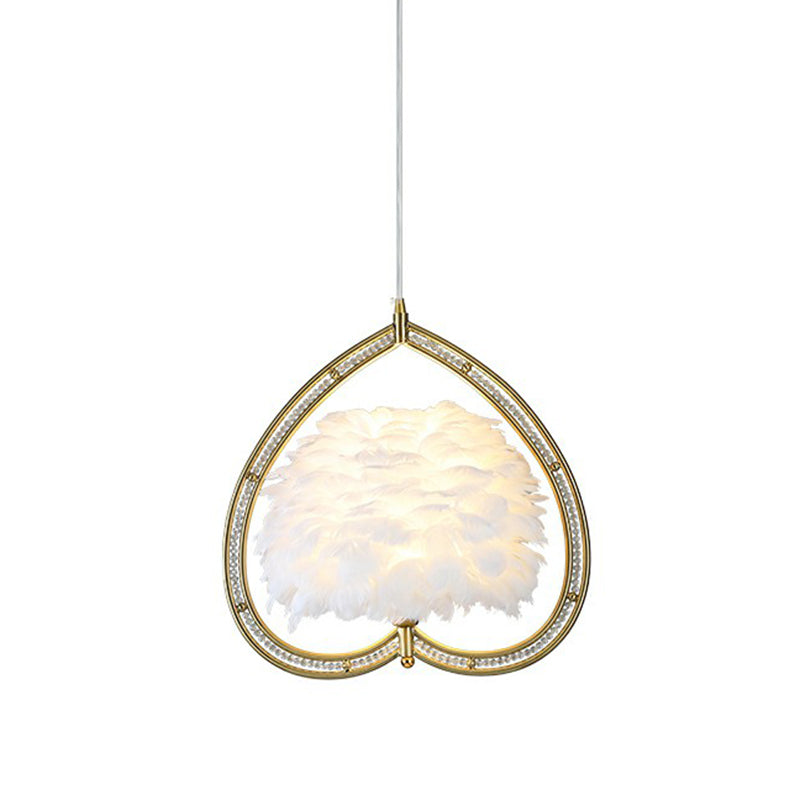 Contemporary Gold Pendant Light With Metallic Heart Suspension And Decorative Feather