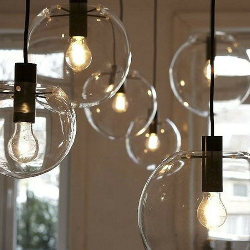 Minimalistic 1-Light Black Pendant Light Fixture - Clear Glass Globe Design for Restaurants