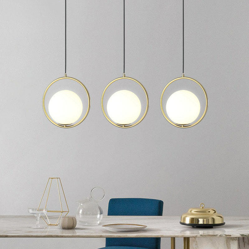 Postmodern Gold Globe Bedside Pendulum Ceiling Pendant with Cream Glass