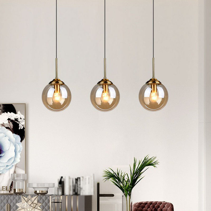 Sleek Glass 3-Bulb Brass Suspension Pendant Light for Minimalistic Dining Room Decor