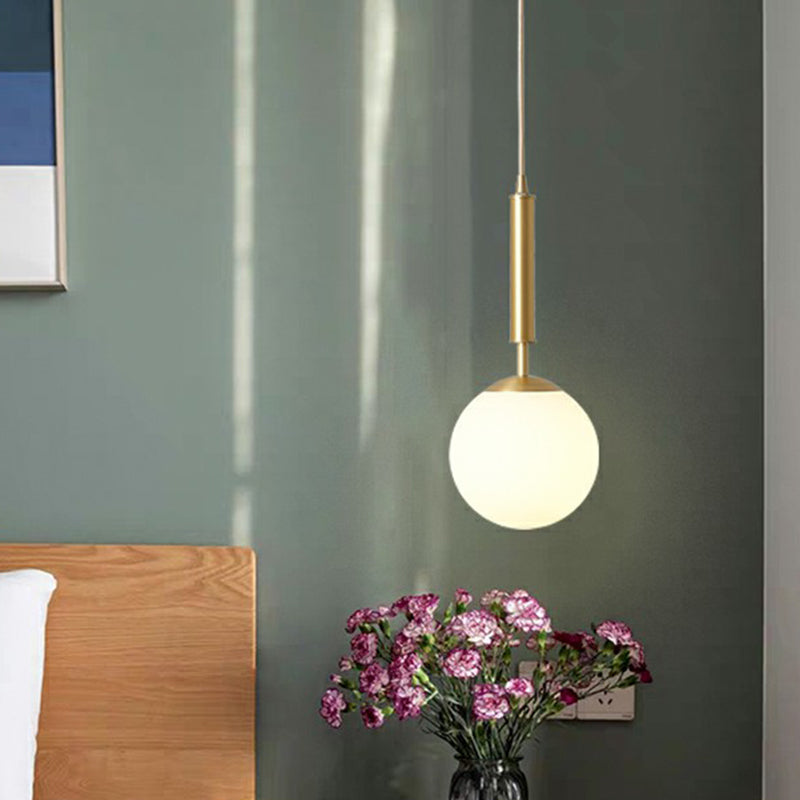 Minimalist Milk Glass Ball Pendant Light in Brass - 1-Light Hanging Lamp for Dining Room