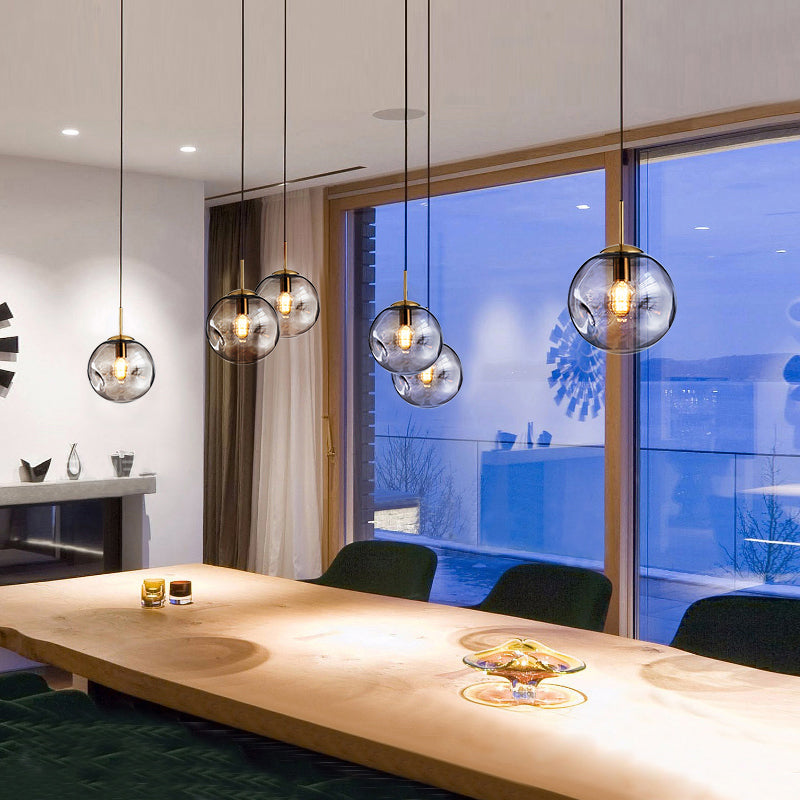 Postmodern Brass Pendant Lamp with Dimpled Glass Globe for Bedroom