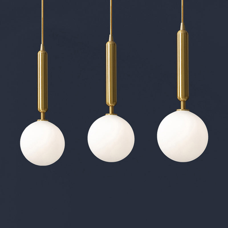 Postmodern Brass Pendant With Ball Glass Shades - Stylish 3-Light Ceiling Fixture For Dining Rooms