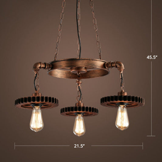 Lustre suspendu en fer de style industriel avec finition en bronze et décoration en forme de roue dentée – Bare Bulb Lighting