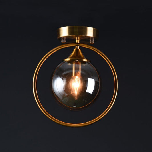 Postmodern Glass Ball Ceiling Light With Brass Metal Ring - 1-Light Semi-Flush Mount For Corridors