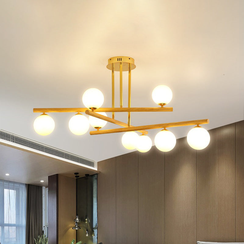 Lustre sphérique en bois avec abat-jour en verre opale pour un éclairage de chambre minimaliste