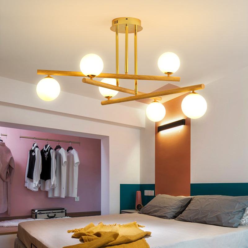 Lustre sphérique en bois avec abat-jour en verre opale pour un éclairage de chambre minimaliste