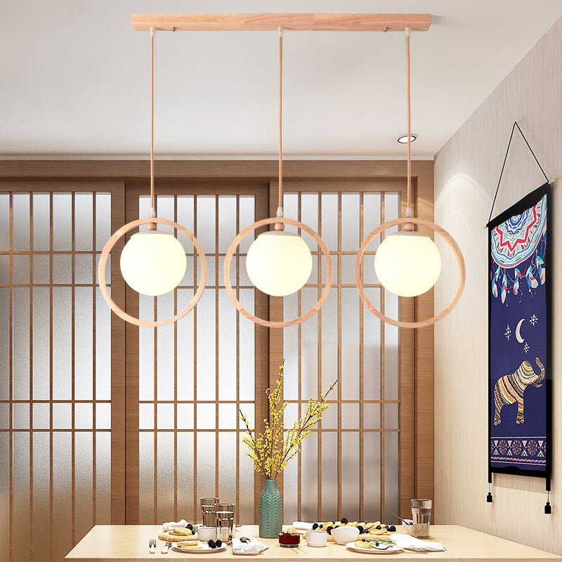 Nordic Style Opaline Glass Ball Pendant Light With Wooden Ring In Beige