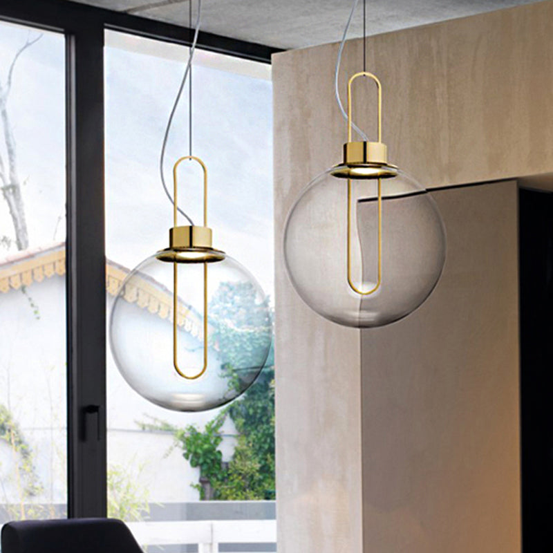 Plafonnier suspendu en forme de sphère en verre transparent moderniste avec 1 lumière en or/chrome/or rose et éclairage blanc