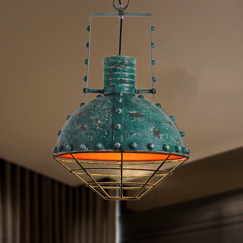 Metal Ceiling Hanging Light: Rustic Wrought Iron Pendant Lamp with Wire Guard and Rivets in Black/Green
