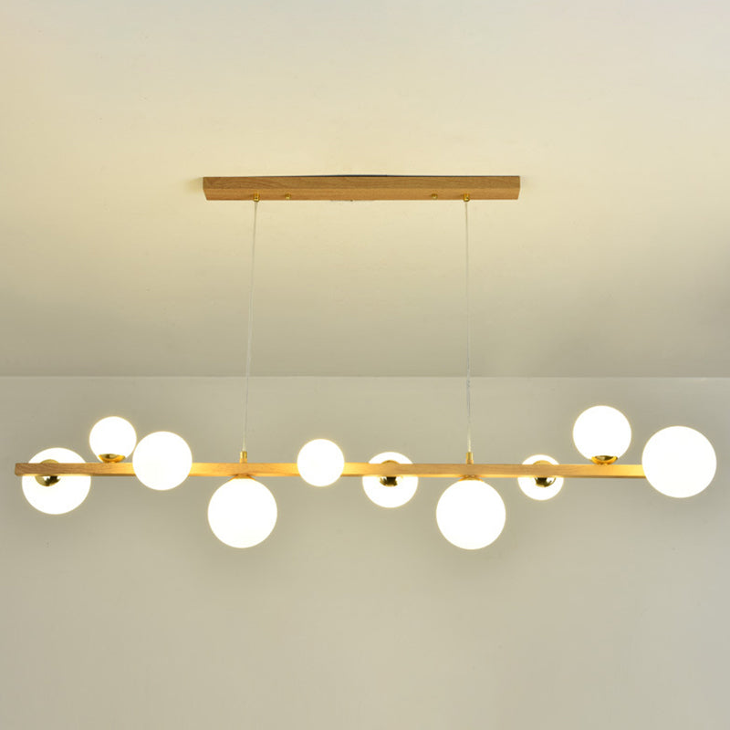 Contemporary Wood Pendant With Glass Globe Shade For Dining Room