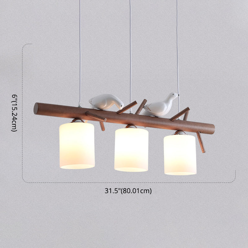 Contemporary Wood Island Pendant With Nutcracker Design And Cylindrical Glass Shades - Set Of 3
