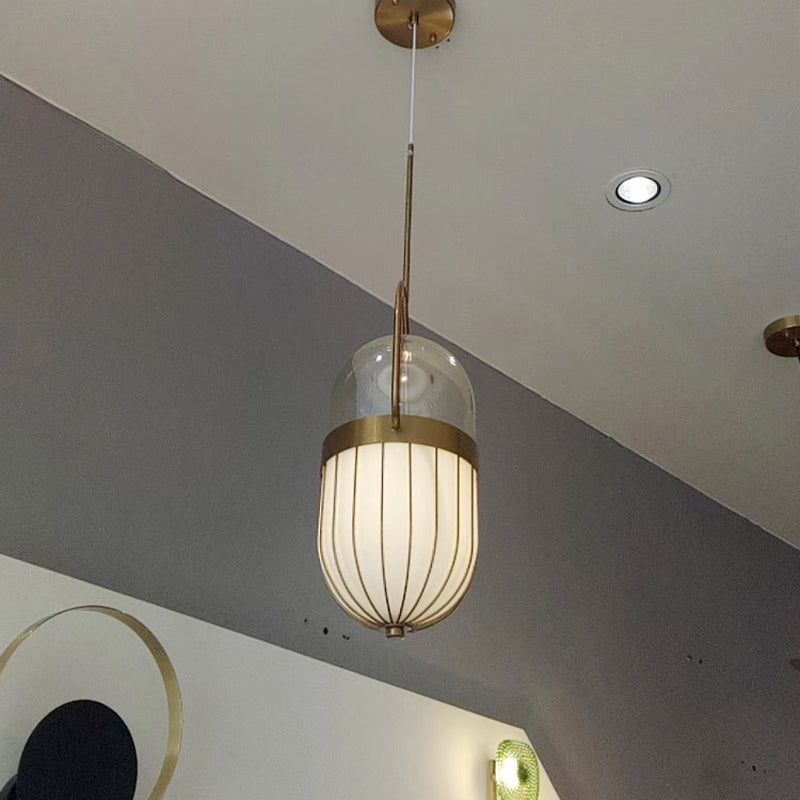 Postmodern Clear & White Glass Pill Capsule Pendant Lamp - 1 Head Dining Room Ceiling Light in Gold