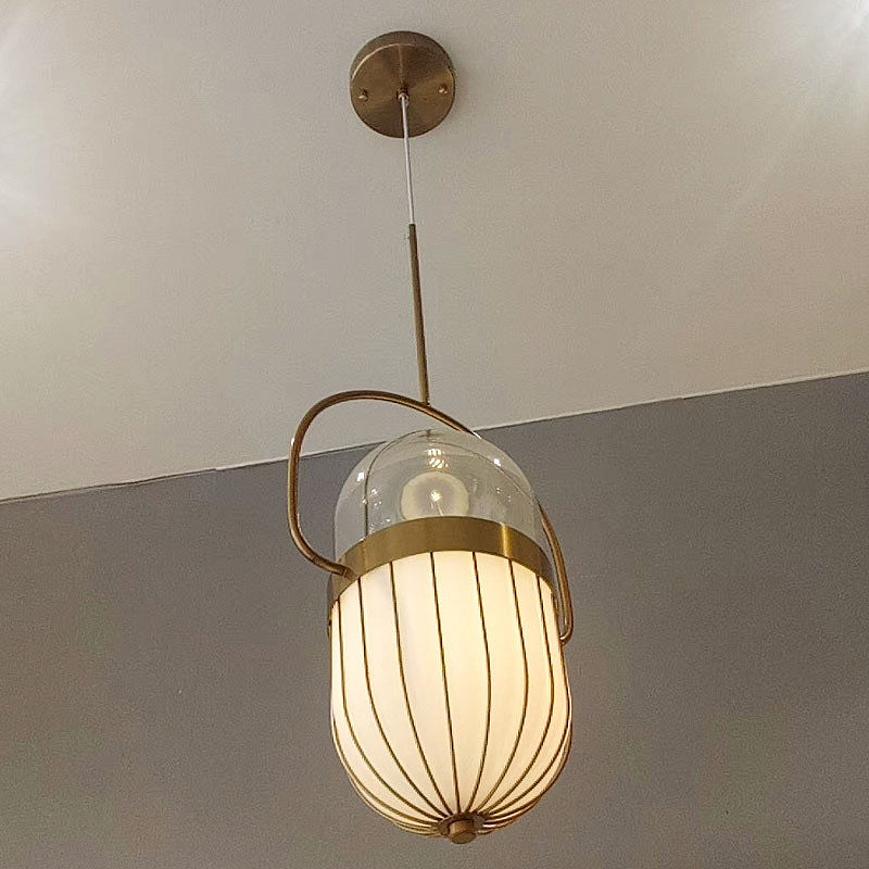 Postmodern Clear & White Glass Pill Capsule Pendant Lamp - 1 Head Dining Room Ceiling Light in Gold