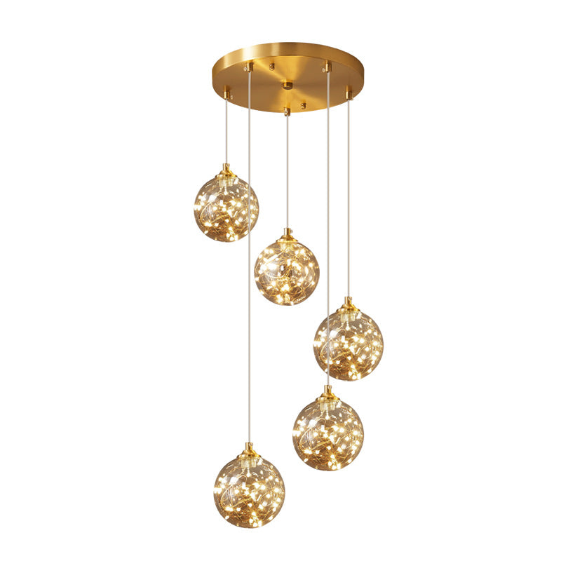 Lampe à suspension LED en verre ambré nordique avec finition en laiton et design étoilé pour chambre à coucher