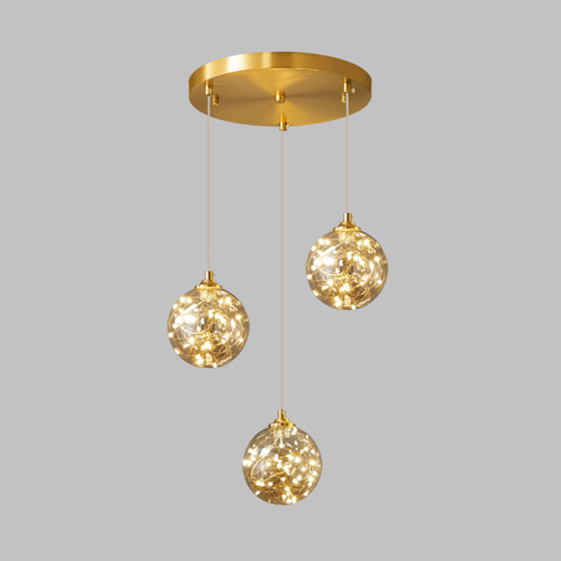 Lampe à suspension LED en verre ambré nordique avec finition en laiton et design étoilé pour chambre à coucher