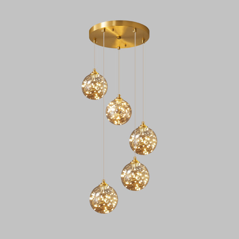 Lampe à suspension LED en verre ambré nordique avec finition en laiton et design étoilé pour chambre à coucher