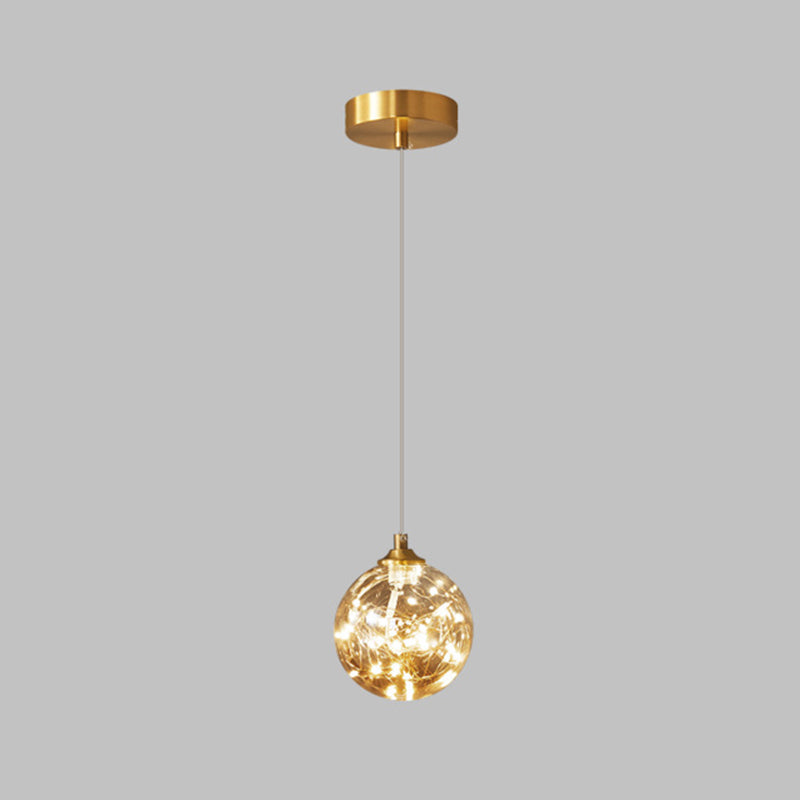 Lampe à suspension LED en verre ambré nordique avec finition en laiton et design étoilé pour chambre à coucher
