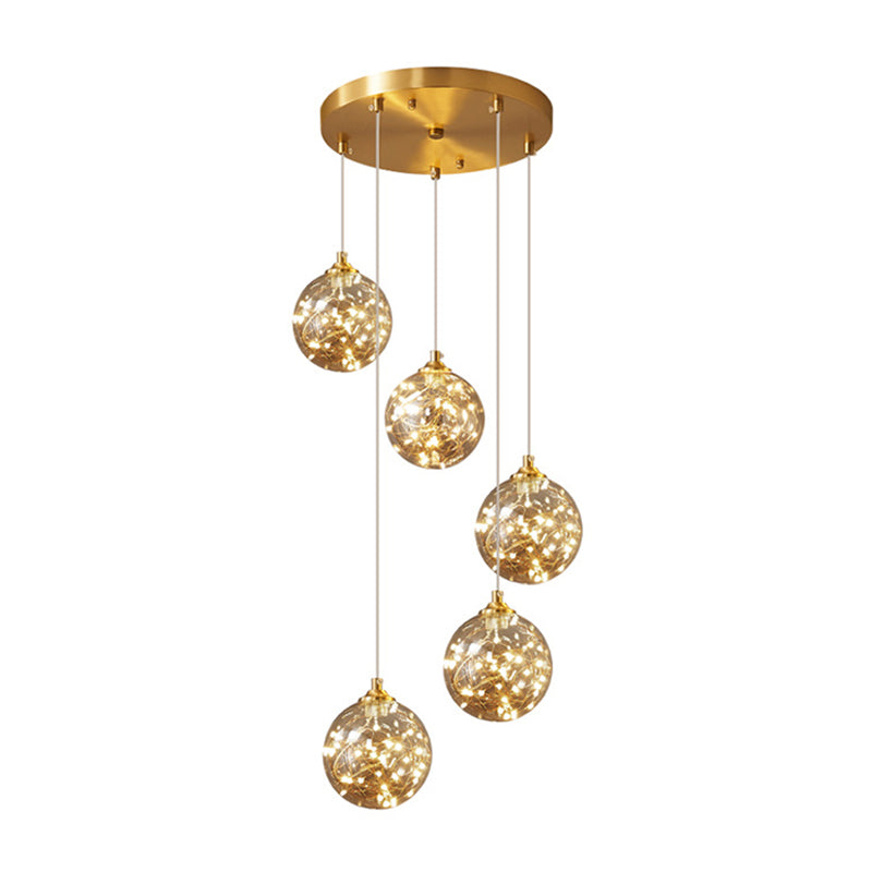 Lampe à suspension LED en verre ambré nordique avec finition en laiton et design étoilé pour chambre à coucher