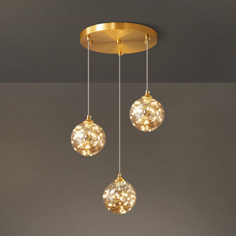 Lampe à suspension LED en verre ambré nordique avec finition en laiton et design étoilé pour chambre à coucher