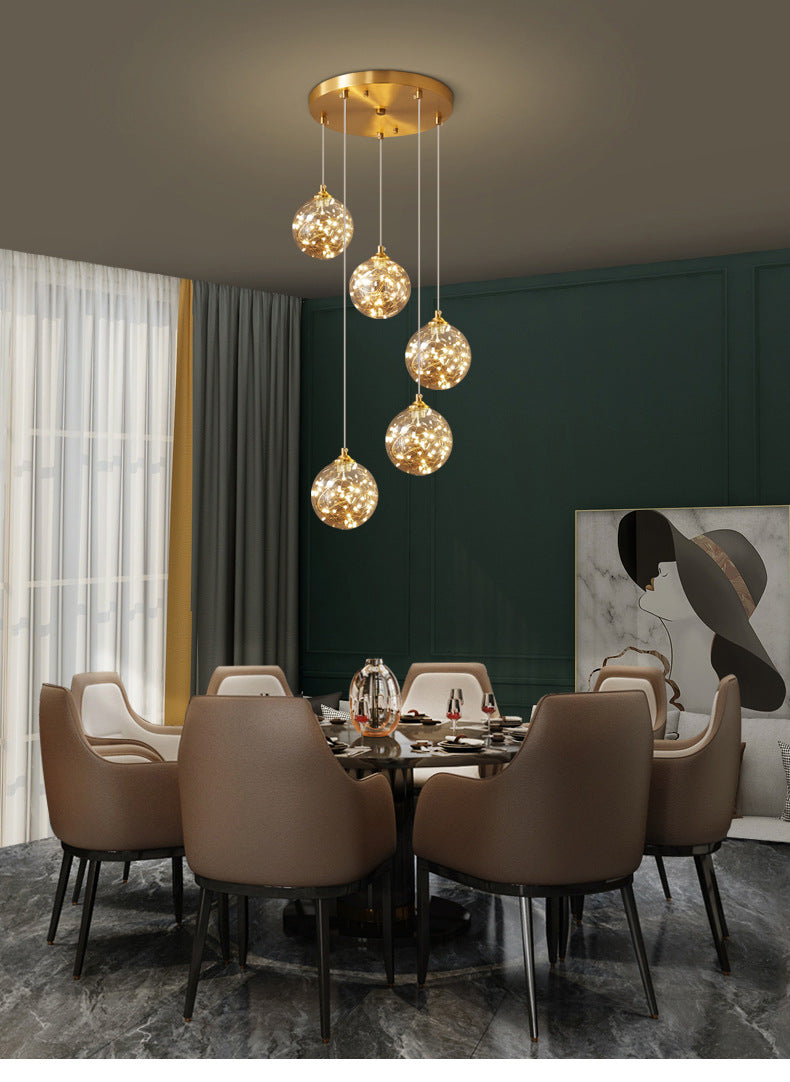 Lampe à suspension LED en verre ambré nordique avec finition en laiton et design étoilé pour chambre à coucher