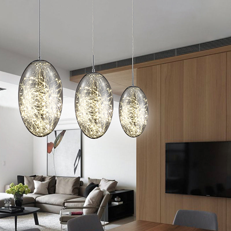 Suspension LED ovale contemporaine en verre gris fumé/ambre pour salon