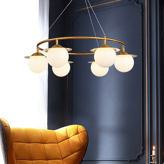 Lustre moderne en forme de sphère dorée avec 6 ampoules et verre blanc - Lampe à suspension élégante