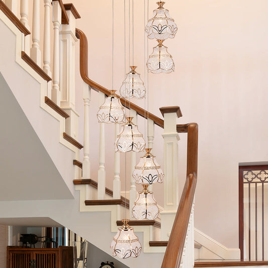 Contemporary 8-Light Spiral Hanging Stair Pendant - White Glass with Flower Shade