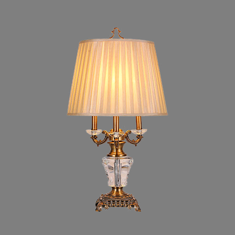Modern Beige Fabric Pleated Desk Lamp With Bronze Sculpted Metal Base - 1 Bulb