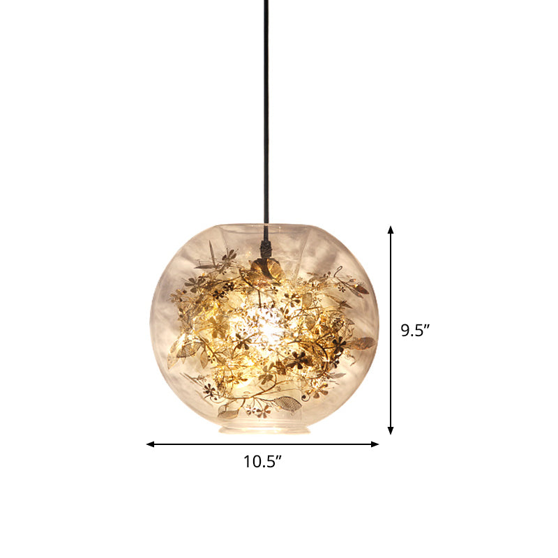 Suspension moderne en forme de sphère dorée avec verre transparent et détails de feuilles brisées