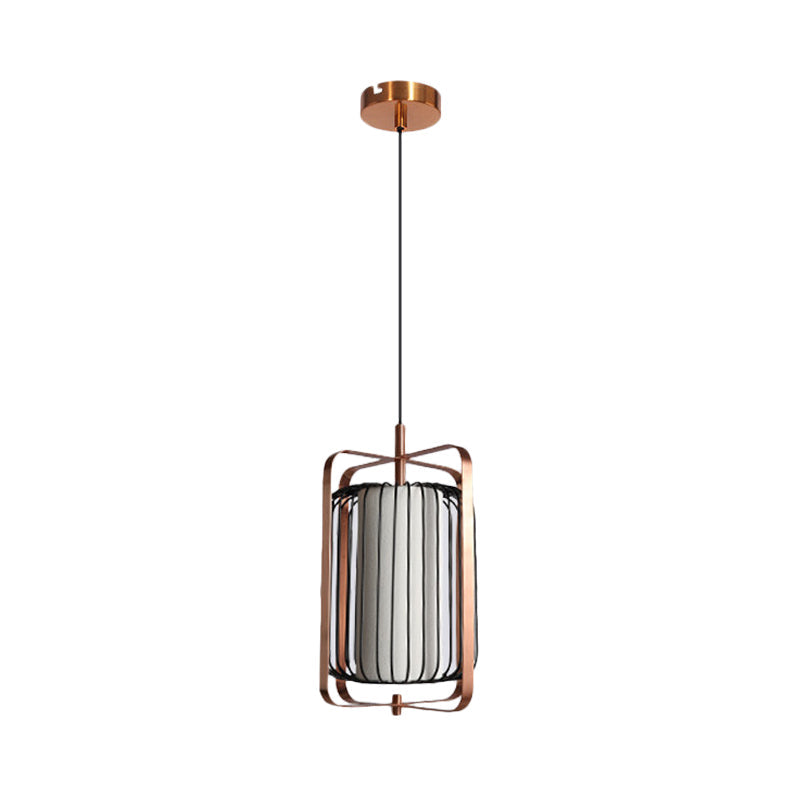 Modernist Metal 1-Light Rose Gold Pendant With Black Cage And White Fabric Shade