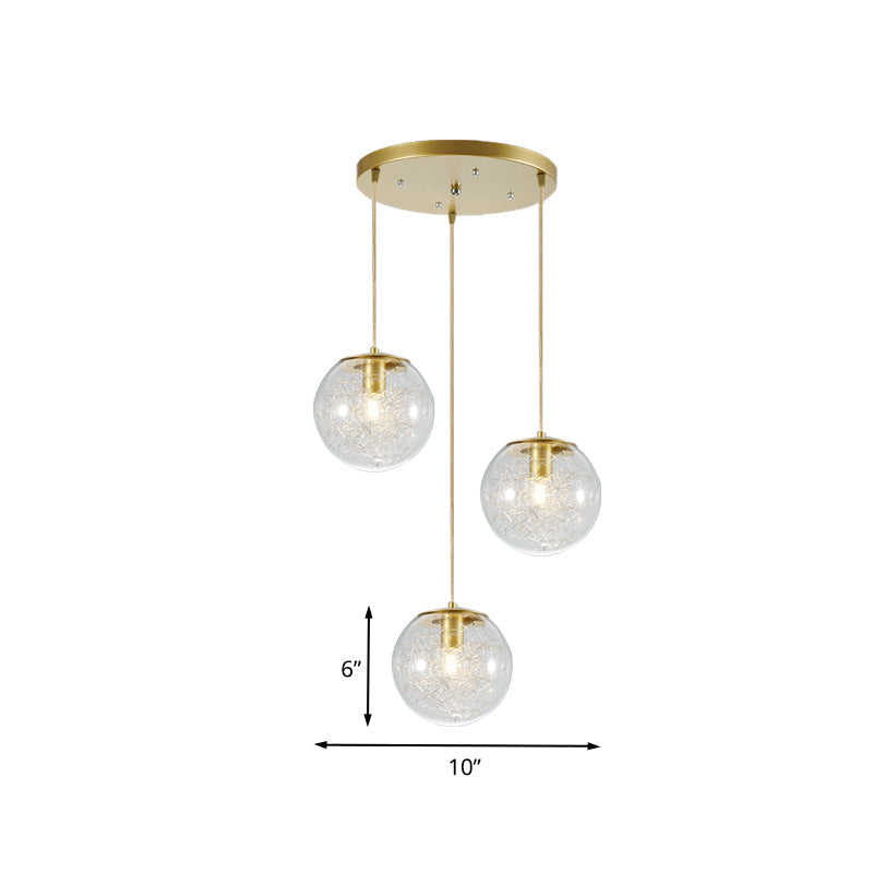 Suspension boule citrouille décorative en métal doré avec verre transparent - Lampe suspendue minimaliste à 3 lumières pour cafés
