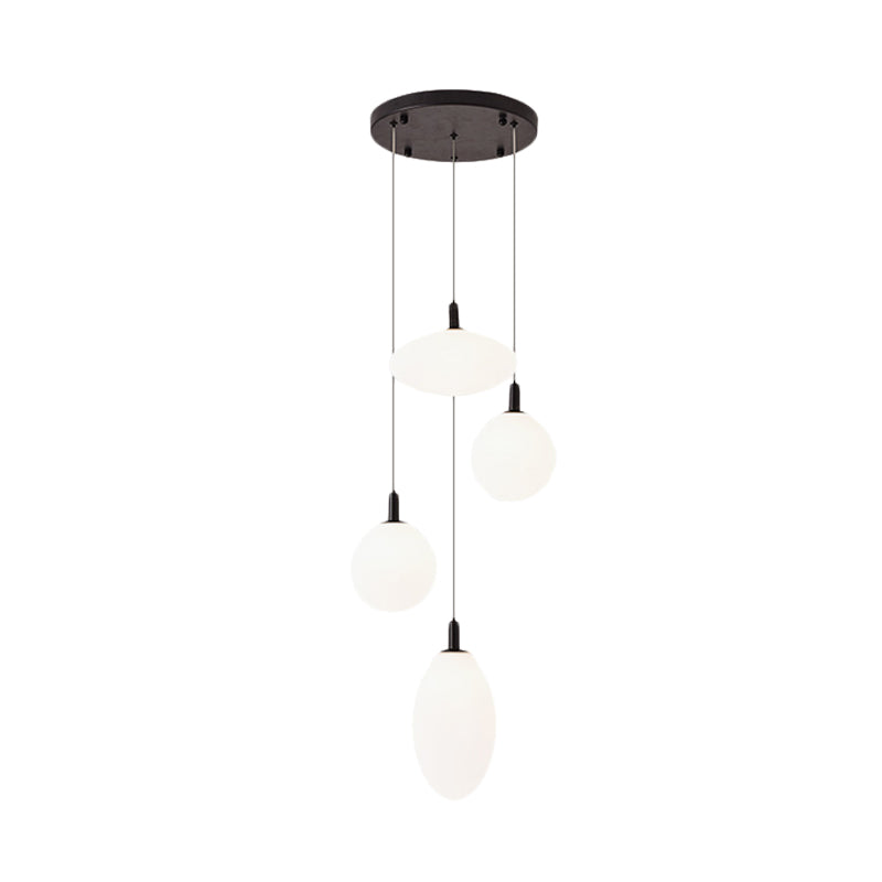 Lampe à suspension minimaliste dorée/noire avec 4 lumières et verre crème
 ou
 "Lampe suspendue minimaliste à 4 lumières en or/noir avec verre crème