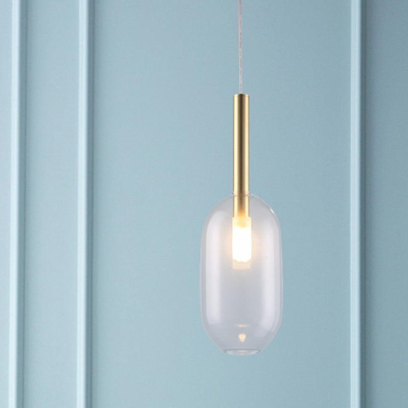 Lampe suspendue à LED en laiton avec abat-jour en verre transparent pour un salon élégant