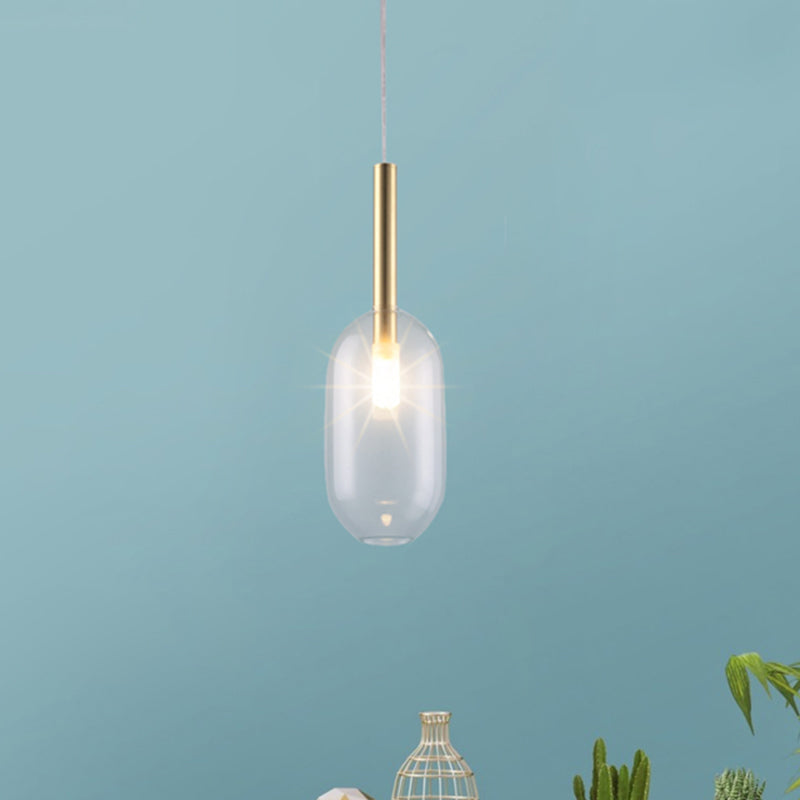 Lampe suspendue à LED en laiton avec abat-jour en verre transparent pour un salon élégant